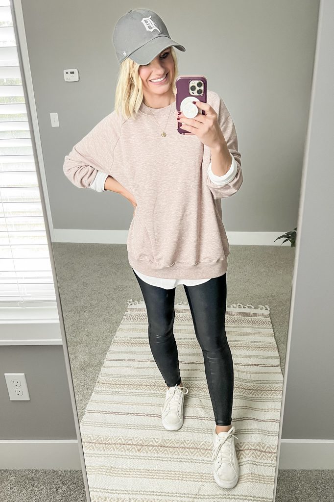 Sweatshirt and baseball cap