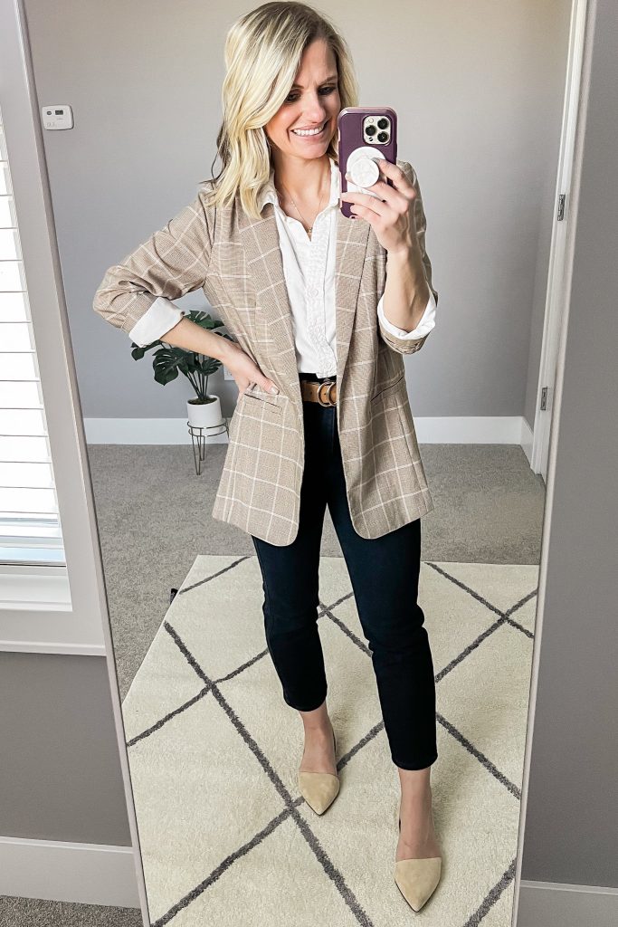 Plaid blazer with black pants.