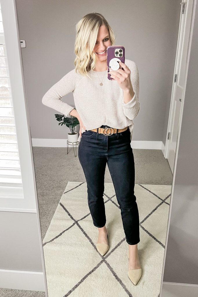 Tan sweater with black pants.