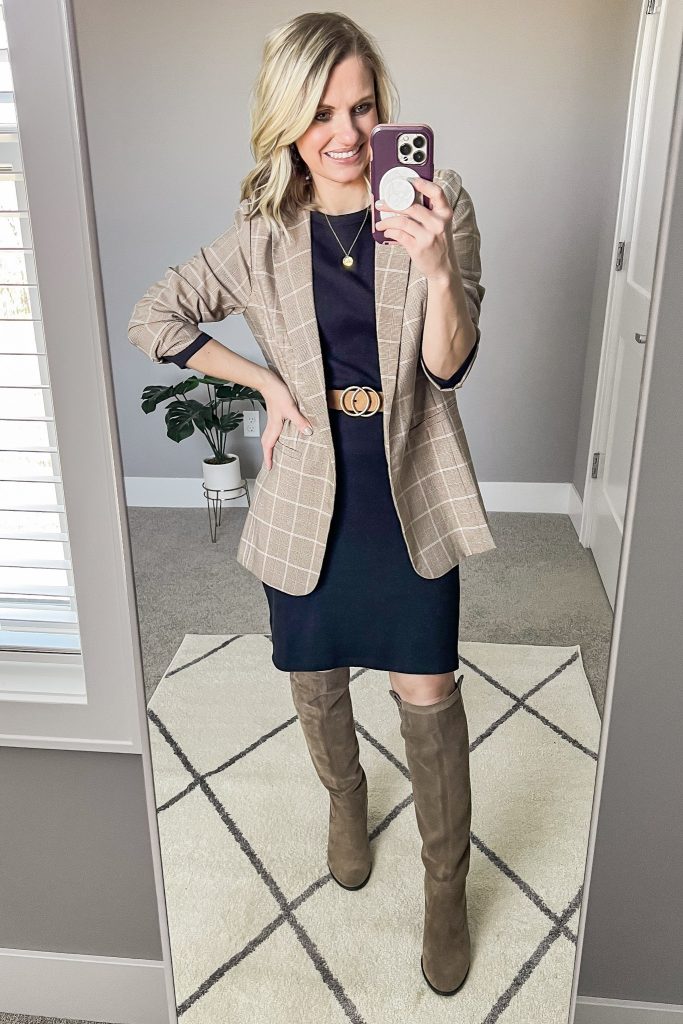 Black dress with tan plaid blazer.