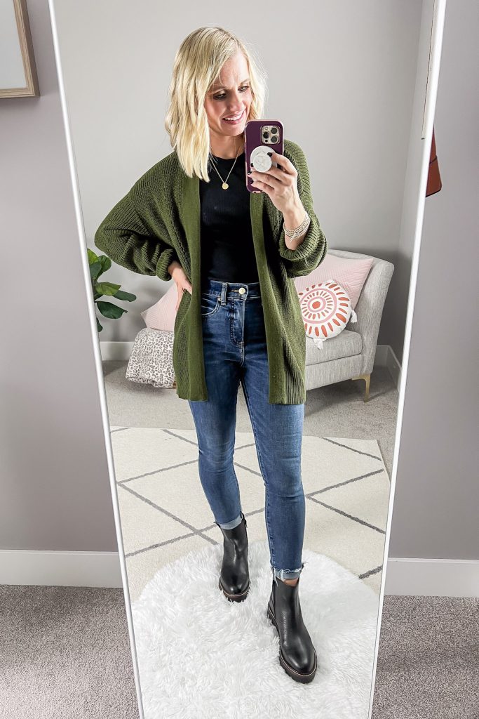 Chelsea boots styled with skinny jeans rolled.