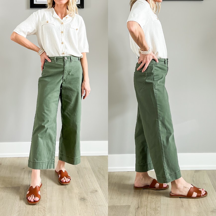 Slide sandals paired with cropped wide-leg pants.