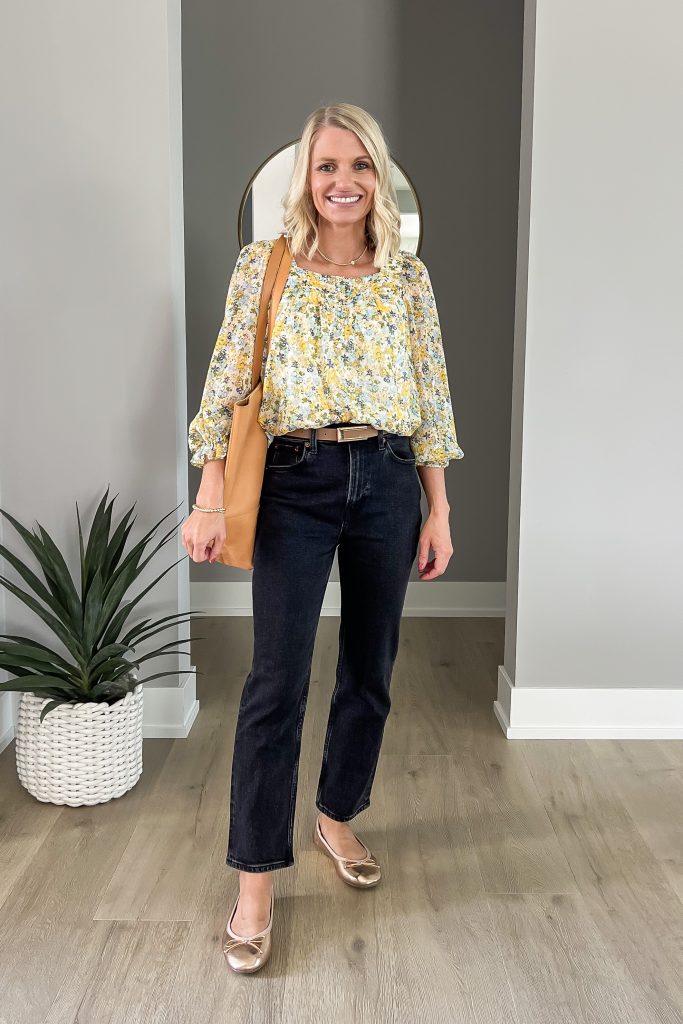 Statement bloused worn with black straight leg jeans.