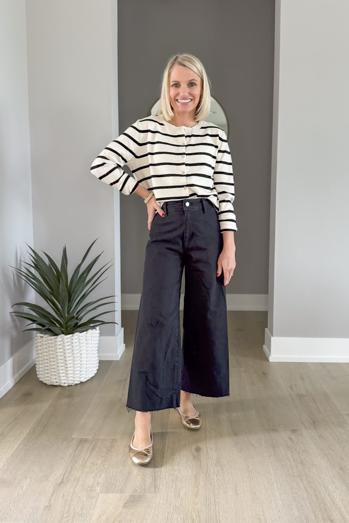 Striped cardigan sweater with wide-leg cropped jeans.