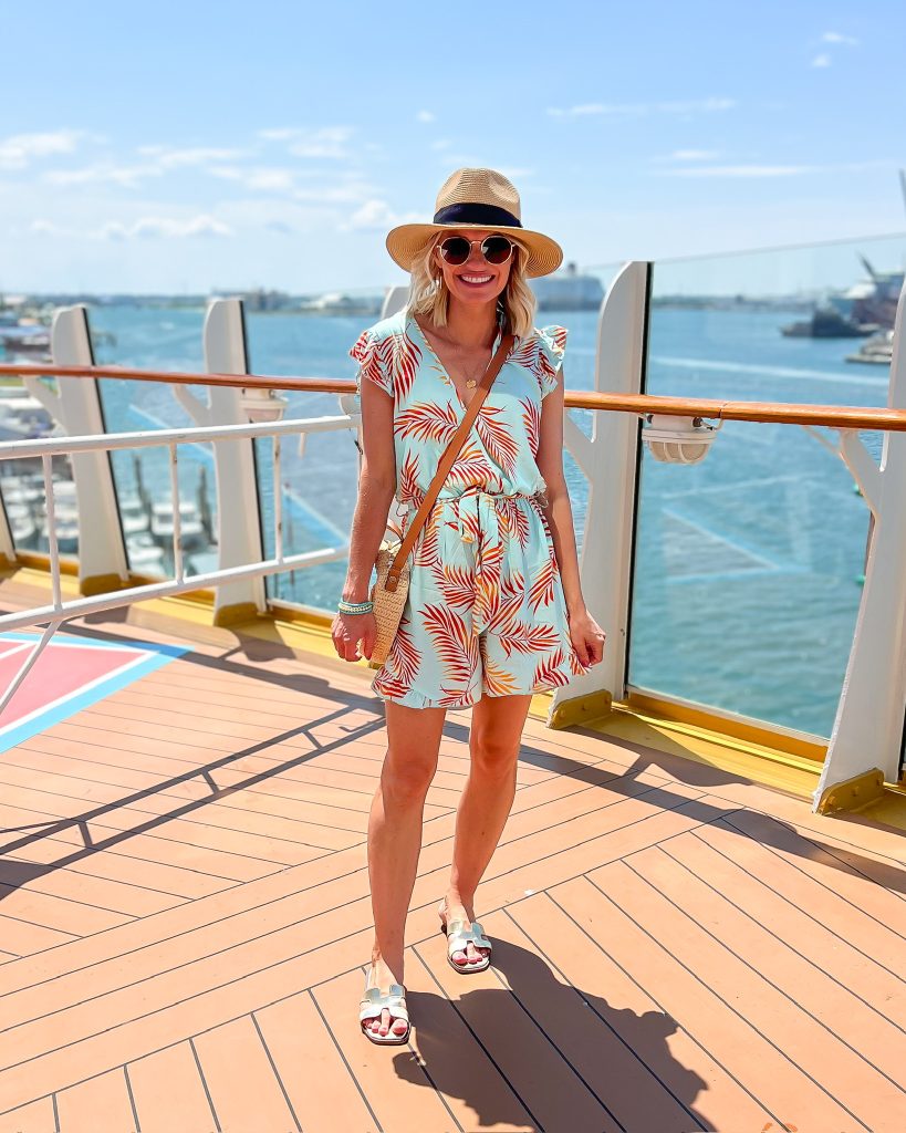 what to wear on a Caribbean cruise tropical romper with sandals and sun hat