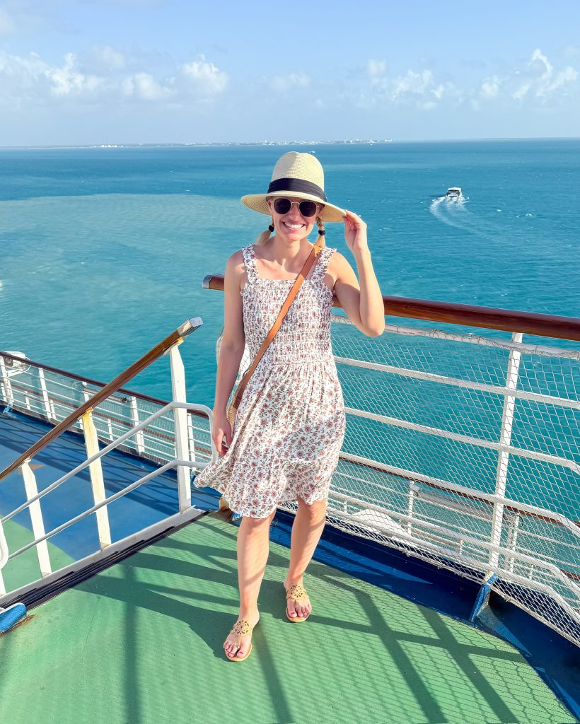Caribbean cruise outfit ideas floral dress and straw hat